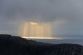Knivskjellodden landscape with beautiful stormy clouds and sunbeams, view from North Cape, Nordkapp, Northern Norway Royalty Free Stock Photo