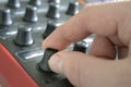 Knob being turned by hand. mixing / mastering Royalty Free Stock Photo