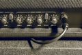 Knob control and jack connector of amplifier background. Royalty Free Stock Photo