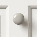 The knob has a glossy surface reflecting light adding a sleek and modern touch Royalty Free Stock Photo