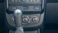 Knob for selecting the gear of a manual gearbox. Manual transmission knob in the car. Close-up of the gear shift lever. Vehicle Royalty Free Stock Photo