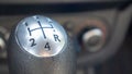 Knob for selecting the gear of a manual gearbox. Manual transmission knob in the car. Close-up of the gear shift lever. Vehicle Royalty Free Stock Photo