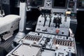 Knobs and buttons. Close up focused view of airplane cockpit Royalty Free Stock Photo