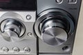 Knobs of manual adjustment on home music system close-up Royalty Free Stock Photo