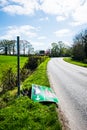 Knocked over and abandoned road sign England