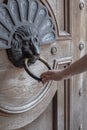 Knocking on the door, antique vintage wooden lion head door, private property