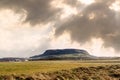 Knocknarea hill, Stranhill town, county Sligo, Ireland. Cloudy sky. Sligo airport airfield. Warm sunny day. Dramatic sky. Popular