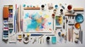 Knolling picture showing drawing equipment and paper. Theme colour is light blue