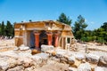 Unknown people visit ancient ruins of famous Minoan palace of Knossos, Crete Island, greece