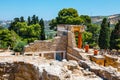 Unknown people visit ancient ruins of famous Minoan palace of Knossos, Crete Island, greece Royalty Free Stock Photo