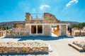 Unknown people visit ancient ruins of famous Minoan palace of Knossos, Crete Island, greece Royalty Free Stock Photo