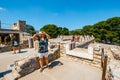 Unknown people visit ancient ruins of famous Minoan palace of Knossos, Crete Island, greece Royalty Free Stock Photo