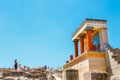 Unknown people visit ancient ruins of famous Minoan palace of Knossos, Crete Island, greece Royalty Free Stock Photo