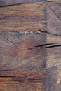 Knot on a log house detail vertical closeup. Royalty Free Stock Photo
