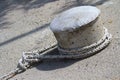 Knot of the rope on the bollard closeup. Royalty Free Stock Photo