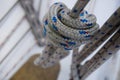 Knot in a rope on a ship hanging from the mast.