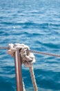 Knot, thick rope on the background of sea