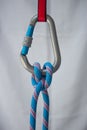 Clove hitch tied with a climbing rope to a pear shaped locking carabiner Royalty Free Stock Photo