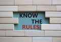 Know the rules symbol. Wooden blocks with words Know the rules. Beautiful grey green background. Business and Know the rules Royalty Free Stock Photo