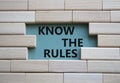 Know the rules symbol. Wooden blocks with words Know the rules. Beautiful grey green background. Business and Know the rules Royalty Free Stock Photo