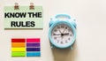 Know the rules written on the blue alarm clock sticker Royalty Free Stock Photo