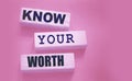 Know Your Worth on wooden blocks. Self motivation coaching HR concept Royalty Free Stock Photo