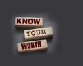 Know Your Worth on wooden blocks. Self motivation coaching HR concept Royalty Free Stock Photo