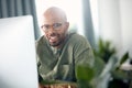 Know your worth and youll never doubt yourself again. a young businessman sitting behind a computer in his office. Royalty Free Stock Photo