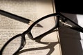 Book, pencil and a pair of glasses Royalty Free Stock Photo