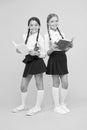 Knowledge day. School day. School friendship. Girl with copy books or workbooks. Study together. Kids cute students Royalty Free Stock Photo