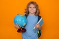 Knowledge day. School pupil with world globe and book. School kid student learning, study geography or literature at Royalty Free Stock Photo