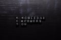 Knowledge - Empowers - You KEY on wooden blocks. Education, Motivation and inspiration concept Royalty Free Stock Photo