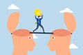 Knowledge transfer, businessman with idea lamp walks on bridge from one brain of human head to another Royalty Free Stock Photo