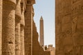 Thutmose I obelisk at the centre of Karnak temple with the sandstone columns, Egypt Royalty Free Stock Photo