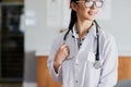 She knows exactly what shes doing. a young female doctor standing in her office in the hospital.