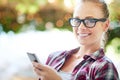 She always knows whats happening online. a young woman using her cellphone at home.