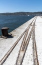 Old railroad tracks on seawall. South Africa Royalty Free Stock Photo