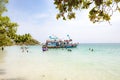 local people on a Boattrip enjoy the clear water and beach in Ko Samet