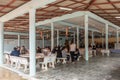 People wait to see Buddhist monks on Ko Samui Island, Thailand