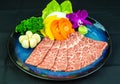 Kobe beef cut thin slices arranged in a plate. Royalty Free Stock Photo