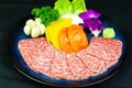 Kobe beef cut thin slices arranged in a plate. Royalty Free Stock Photo