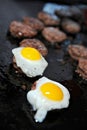 Kobe beef Sliders topped with quail egg Royalty Free Stock Photo