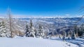 Kobesnock - Panoramic view of the snowcapped mountain ranges of High Tauern and Nock Mountains Royalty Free Stock Photo