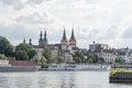 Koblenz, Germany - Aug 1, 2020:Overview of Florinskirche church by Mosel river in summer