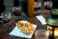 Koblenz GERMANY 16.12.2017 Christmas market fries and mulled red wine on a wooden rustic table. Traditional drink