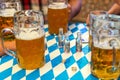 Koblenz Germany -26.09.2018 Close-up of bavarian beer glasses 1 liter bitburger Beer on table decoation at Octoberfest