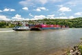 Koblenz, Germany - 1 June 2019. Two connected barges carrying a lot of containers on the Rhine River in western Germany in Koblenz Royalty Free Stock Photo