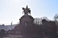 Koblenz, Germany - 02 27 2022: Mosel shore at Deutsches Eck with Kaiser Wilhelm statue from 1897