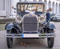 Koblenz Germany 12.12.2019 Wedding Couple in Oldtimer Ford Typ A Tudor Sedan 1928 during a Wedding Decorated