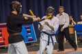 Kobudo competition men with nunchaku